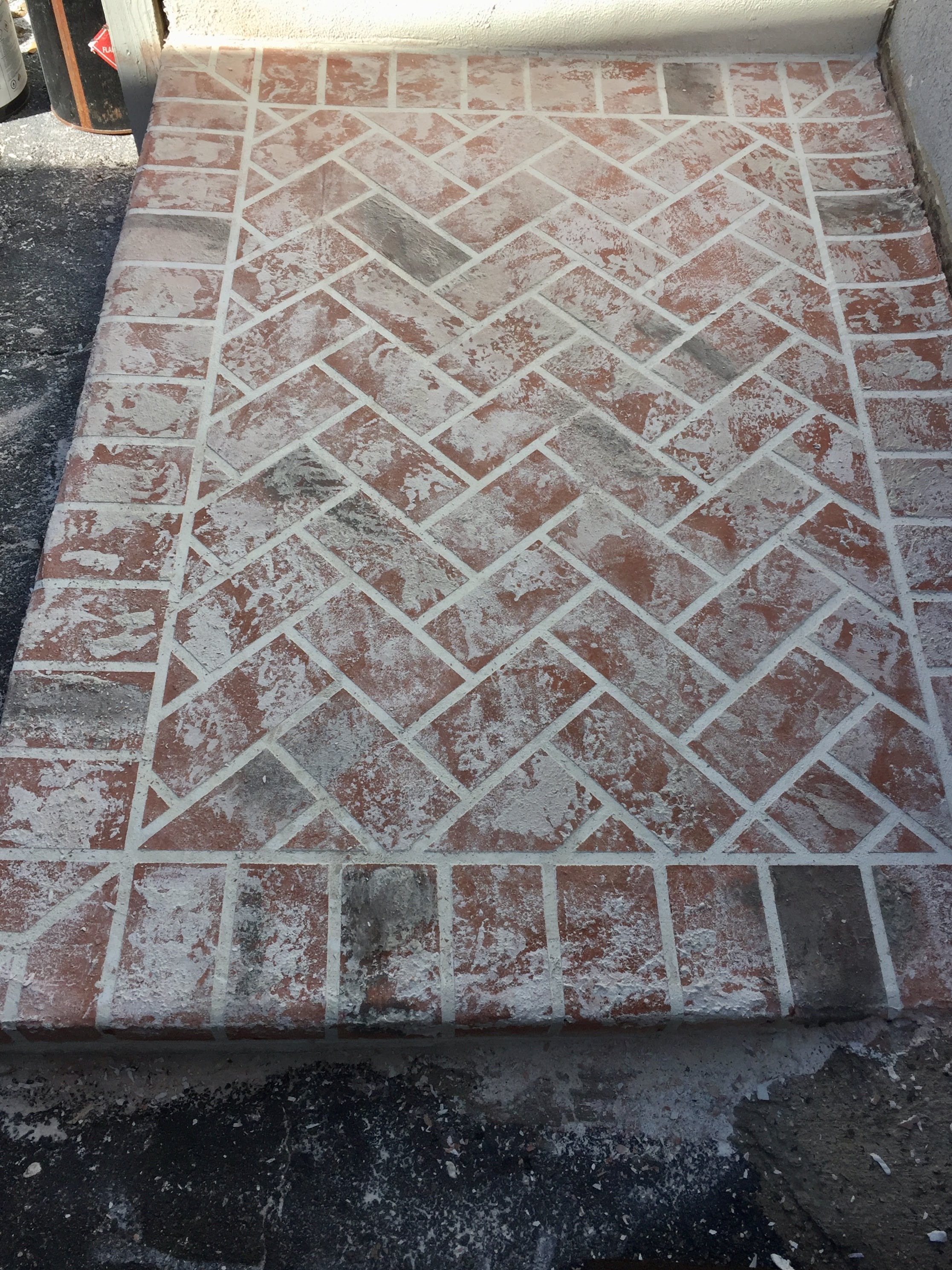 Herringbone brick pattern concrete overlay patio Hinesville GA